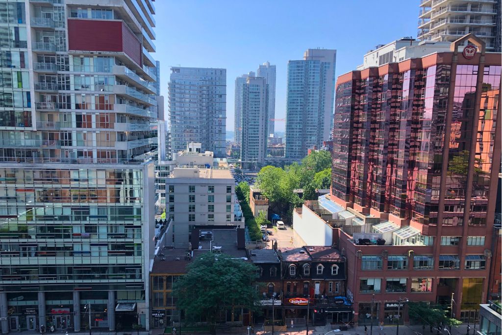 The view of several condo buildings on King Street in a safe neighbourhood in Toronto.