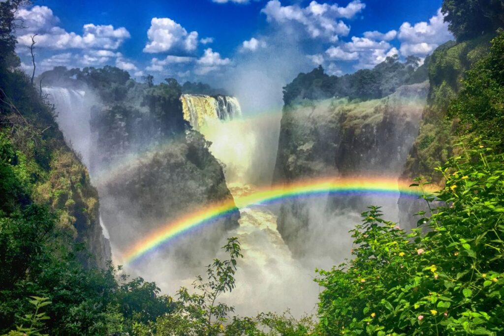 The view of a rainbow at Victoria Falls in Zambia and Zimbabwe, which is  the biggest waterfall in the world.