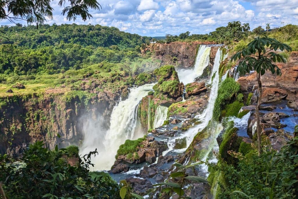 A close up view of several individual waterfalls at Iguazu Falls in Argentina.