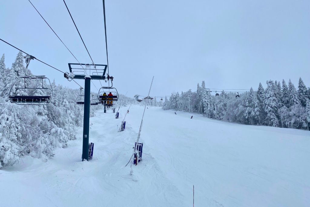 View of a ski slope from a chairlift at Mont Tremblant in Quebec. Access to amazing ski resorts is one of the biggest advantages of living in Canada for many people.