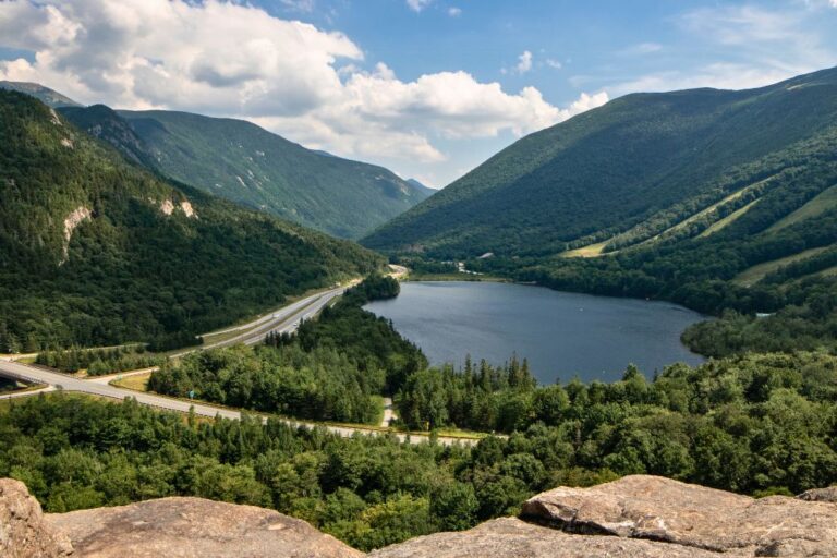 A road winding through a mountain landscape in New Hampshire.