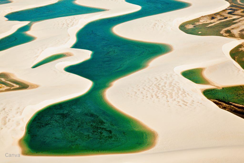 Aerial view of a lagoon at the Lençóis Maranhenses National Park in Brazil. Photo by Gabriel Boieras via Canva.com.